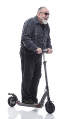 in full growth. an elderly man with an electric scooter