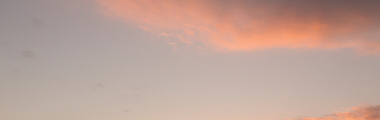 Dramatic colorful sky with afterglow and illuminated clouds