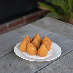Coxinhas, brazilian snacks, finger food, tasty fried food made with chicken