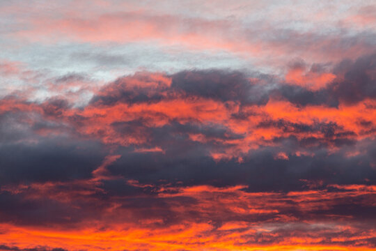 Dramatic colorful sky with afterglow and illuminated clouds © Aquarius
