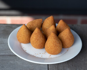 Coxinhas, brazilian snacks, finger food, tasty fried food made with chicken