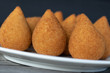 Coxinhas, brazilian snacks, finger food, tasty fried food made with chicken