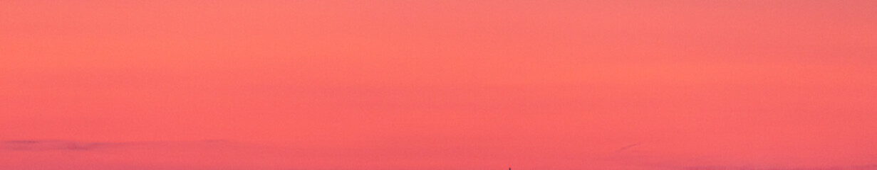 Dramatic colorful sky with afterglow and illuminated clouds
