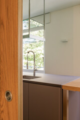 View of kitchen, detail of sink and worktop