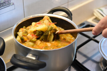 Cooking Vegetable Minestrone in the Cooking Pan