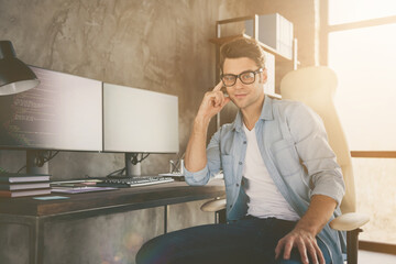 Portrait of his he nice attractive geek guy tech specialist working from home house remote day shift at modern industrial interior style concrete wall work place station