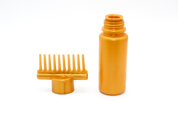 A picture of hair oil bottle on white background