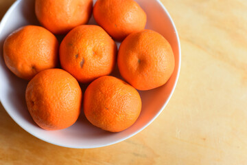 Fresh Colourful Oranges in the Plate