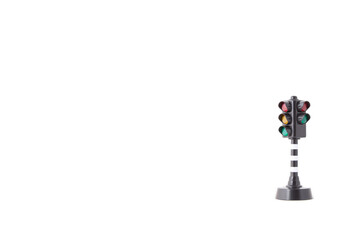 toy traffic light on white background
