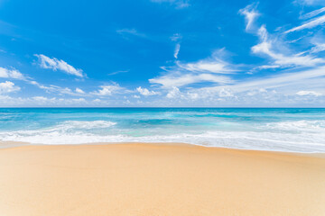 Fototapeta na wymiar Beach sea and white sand with sunny sky. Tropical beach background on touris season at phuket thailand