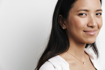 Beautiful happy asian woman smiling and looking at camera