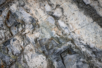 Dark grey black stone background or texture. Selective focus