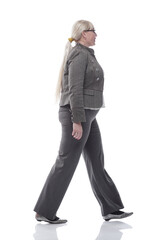 successful business woman stepping forward . isolated on a white