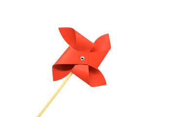 Red pinwheel on a white background.Toy for child.