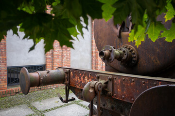 an old rusty spark-free locomotive standing on the promenade in Żyrardów