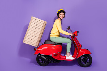Fototapeta na wymiar Full body profile side photo of courier girl drive scooter deliver pizza pie isolated over violet color background