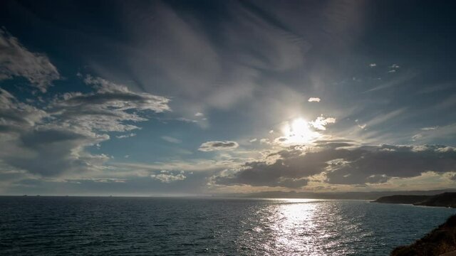 Loopable video of clouds moving in sky over Mediterranean sea