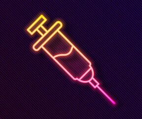 Glowing neon line Doping syringe icon isolated on black background. Vector.