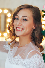 Wedding day and beautiful bride in studio. Beautiful young bride with wedding makeup and hairstyle. Portrait of young gorgeous bride. Wedding.