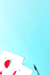 Business materials and a pen.  ビジネス資料とペン