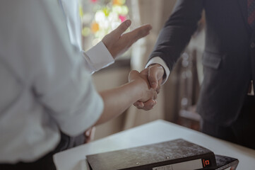 Shake hands to congratulate success