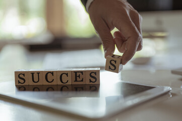 A wooden block that tells of success.