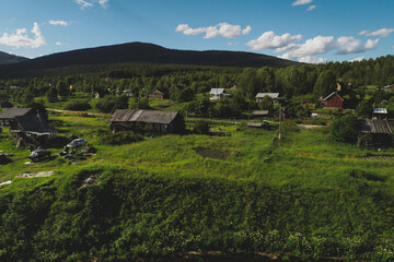Aerial Townscape of Suburban Village Kolvica located in Northwestern Russia on the Kola Peninsula Kandalaksha Area