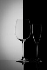 
Two glass goblets on a gradient background