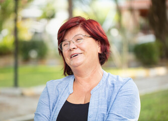 Portrait of beautiful happy and cheerful mature woman.