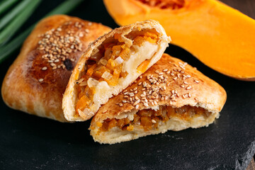 Cut oriental dish baked pie with pumpkin samsa