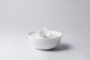 White plate with milk splash