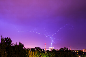 Fototapeta na wymiar Lightning storm over the city