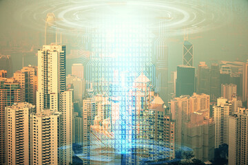 Data theme hologram drawing on city view with skyscrapers background double exposure. Technology concept.