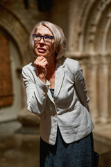 Portrait of a woman visiting museum or art gallery