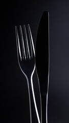 Cutlery set. Fork, knife. Isolated on black background.