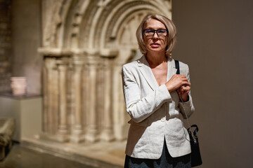Fototapeta premium Portrait of woman visiting museum
