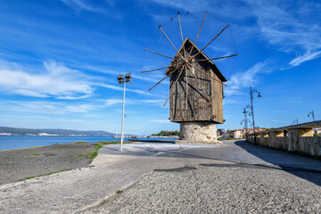 Fototapeta na wymiar windmill on the coast