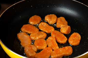 Fresh pumpkin gnocchi. Close-up. Homemade food. Orange