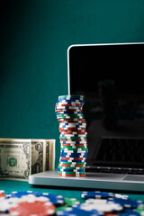 Poker game online with dollars on a table