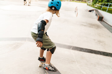 Young boy wearing safety gear