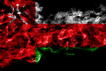 Oman smoke flag isolated on black background