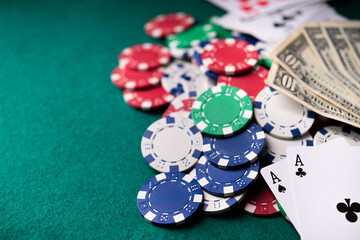 Poker game online with dollars on a table