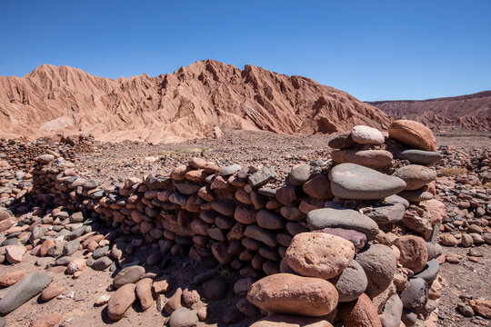 Remnants of rock structures in Tambo de Catarpe, Catarpe Valley in the Atacama Desert, Chile