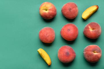 Sweet peaches on color background