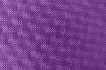 Tax file folder scaly purple texture background, macro photo. Texture of a purple folder for paper. Purple cover texture. Purple background