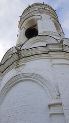 The tall medieval bell tower was built by an unknown Italian architect on the site of an ancient wooden temple