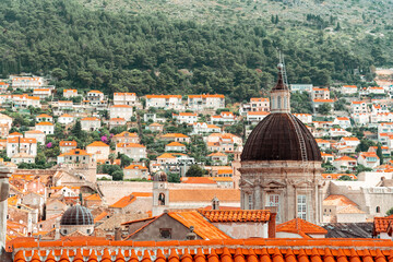 Fototapeta na wymiar A town in the middle of the nature in front of the Old City of Dubrovnik