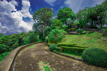 Natural high angle panoramic background With an atmosphere surrounded by mountains and trees, with a blurred wind, cool