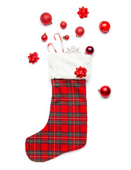 Christmas sock with decor on white background