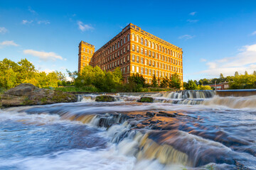 Anchor Mill and waterfall on the River Cart, Paisley, Renfrewshire, Scotland, United Kingdom